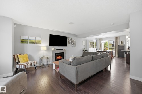 704 176 Street Sw, Edmonton, AB - Indoor Photo Showing Living Room With Fireplace