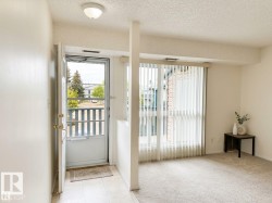 Entryway featuring tile flooring, a solid core door, and a flush mount ceiling light - 