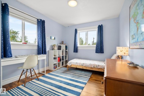 Hardwood-style flooring throughout - 11006 64 Avenue Nw, Edmonton, AB 