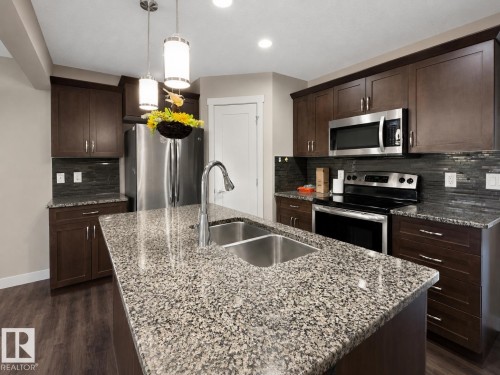 20312 42 Avenue Nw, Edmonton, AB - Indoor Photo Showing Kitchen With Stainless Steel Kitchen With Double Sink With Upgraded Kitchen