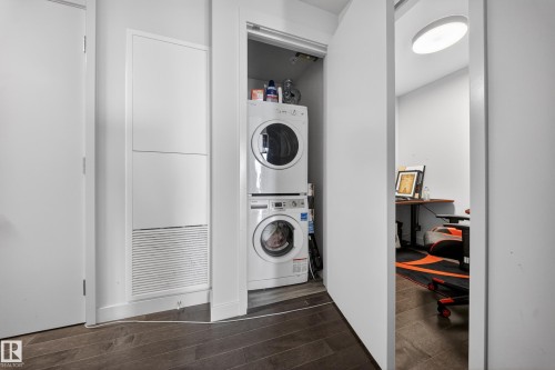Stacked washer and dryer within a dedicated closet - #4007 10360 102 St Nw, Edmonton, AB 