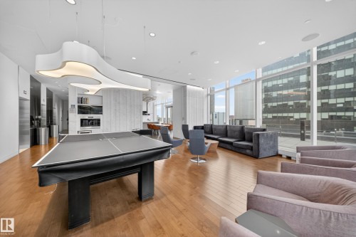 Hardwood flooring, recessed lighting, expansive floor-to-ceiling windows, modern pendant lighting, and built-in amenities - #4007 10360 102 St Nw, Edmonton, AB 