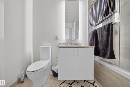 Integrated bathtub with a clear shower panel - #4007 10360 102 St Nw, Edmonton, AB 