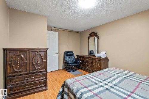Wood-finish flooring with neutral wall paint - 716 Clareview Rd Nw, Edmonton, AB 
