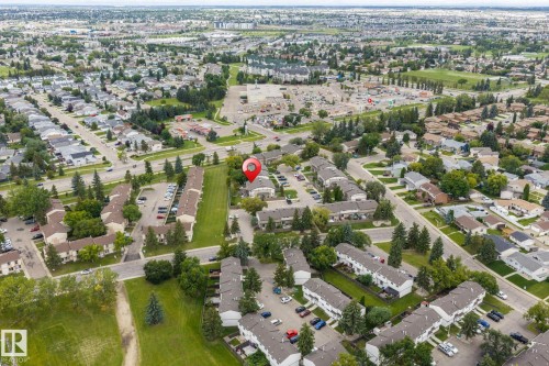 Residential community with tree-lined streets, surrounded by green spaces and commercial areas - 716 Clareview Rd Nw, Edmonton, AB 