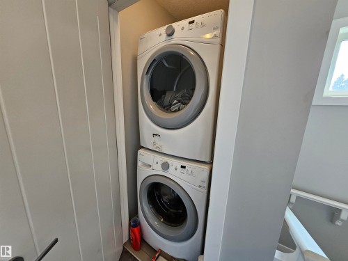Stackable washer and dryer appliances within a dedicated recess - 13309 128 Street Nw, Edmonton, AB 