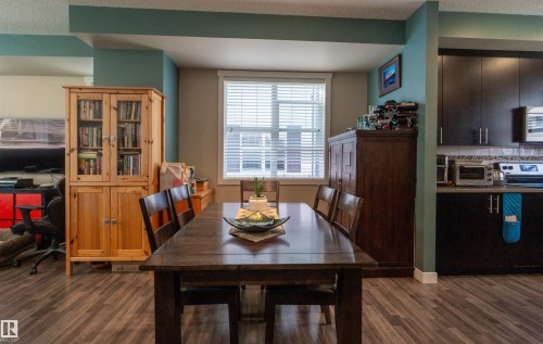 Wood-finish flooring throughout - #75 8315 180 Av Nw, Edmonton, AB 