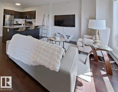 Hardwood-style flooring throughout - #605 10152 104 St Nw, Edmonton, AB 