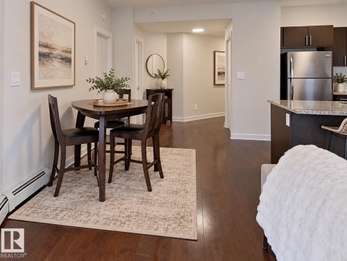 Rich wood-finish flooring throughout - #605 10152 104 St Nw, Edmonton, AB 