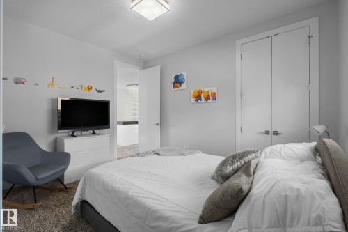 Wall-to-wall carpeting with a neutral finish - 2019 Ware Rd Nw, Edmonton, AB 