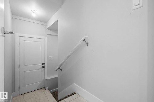 side entrance door to the basement - 2019 Ware Rd Nw, Edmonton, AB 