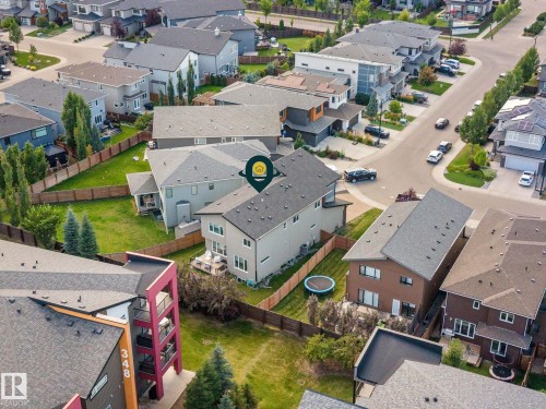 Aerial perspective of a neighborhood with diverse residential architecture and paved streets - 2019 Ware Rd Nw, Edmonton, AB 