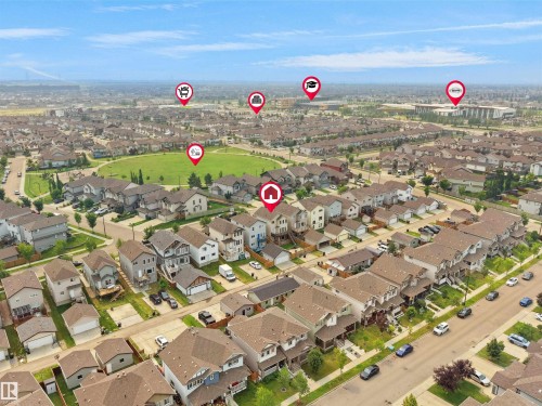 Aerial perspective showcasing a residential neighborhood with diverse housing styles - 1216 29 Avenue Nw, Edmonton, AB - Outdoor With View