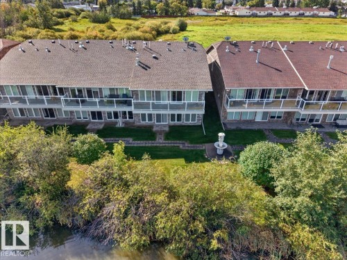 Multiple private balconies with glass railings - #7 10500 103 Av, Morinville, AB 
