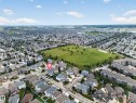 Residential neighborhood featuring single-family homes, multi-story residential buildings, and open green spaces - 6904 18 Avenue Sw, Edmonton, AB 