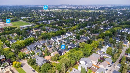 Expansive residential neighborhood with mature trees and varied architectural styles - 10414 134 Street Nw, Edmonton, AB 