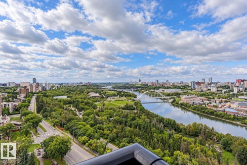 Expansive cityscape with a prominent river, arched bridge, and extensive green spaces - #2005 10149 Saskatchewan Dr Nw, Edmonton, AB 