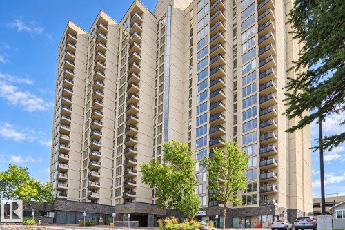 Multi-story residential building with private balconies and a stone-clad base - #2005 10149 Saskatchewan Dr Nw, Edmonton, AB 