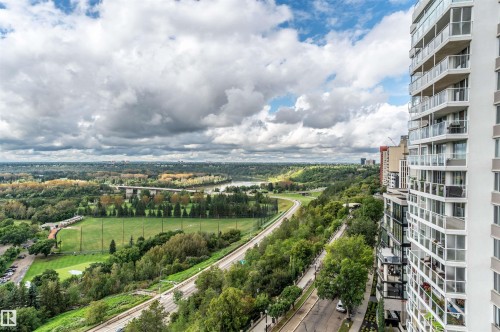 Expansive urban landscape featuring a river, green spaces, and a bridge - #1202 10010 119 St Nw, Edmonton, AB 