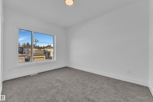 Neutral wall finish, recessed ceiling lighting, and gray carpeting - 226 Linden Loop, Leduc, AB 