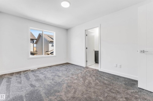 Neutral color palette with textured carpet flooring - #48 710 Mattson Dr Sw Sw, Edmonton, AB 