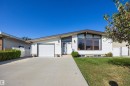 Single-story exterior with white siding and brown trim - 14008 94 Street Nw, Edmonton, AB 