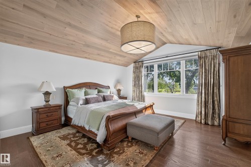 Master Bedroom with Cozy wood feature on ceiling. - 14308 97A Avenue Nw, Edmonton, AB 