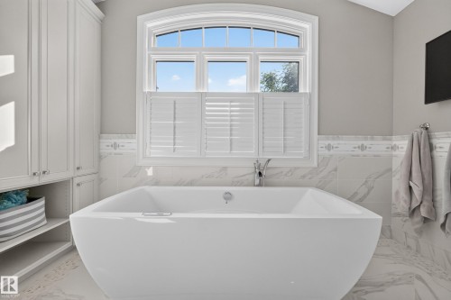 Freestanding Tub with gorgeous Chandelier in vaulted ceiling. - 14308 97A Avenue Nw, Edmonton, AB 