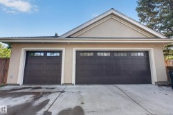 Oversized Garage with 3 car access plus additional in-garage parking. - 