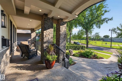 Exposed Aggregate Front Verandah with Coffered Front entry detail - 14308 97A Avenue Nw, Edmonton, AB 
