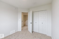 Neutral-toned wall paint with coordinating carpet flooring - 