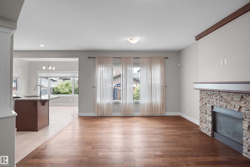 138 Henderson Link, Spruce Grove, AB - Indoor Photo Showing Living Room With Fireplace
