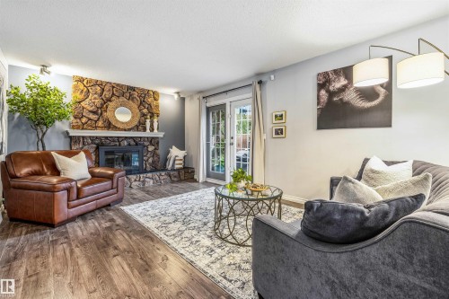 15915 112 Street Nw, Edmonton, AB - Indoor Photo Showing Living Room With Fireplace