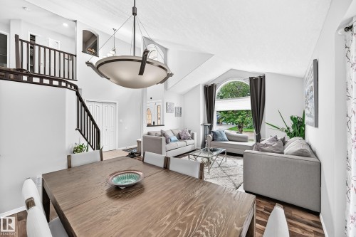 Vaulted ceilings and wood-finish flooring complement the open-concept design - 4216 47 Street Nw, Edmonton, AB 