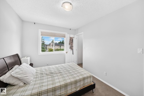 Window with white trim - 4216 47 Street Nw, Edmonton, AB 
