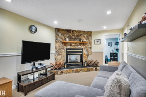 3 Flint Crescent, St. Albert, AB - Indoor Photo Showing Living Room With Fireplace