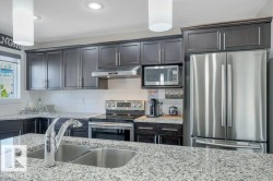 Large granite island and eating bar, SS appliances - 