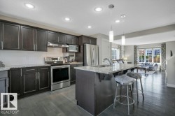 Large granite island with eating bar - 