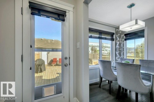 Back door leading to deck and garage - 160 Desrochers Gate Sw, Edmonton, AB 