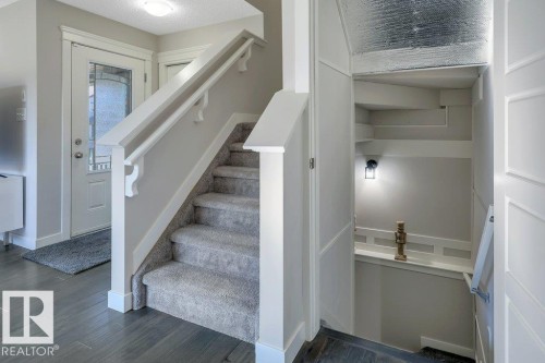 Leading to partially finished basement - 160 Desrochers Gate Sw, Edmonton, AB 