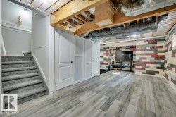 With vinyl plank flooring, wood-slat suspended ceilings and decorative wood plank walls - 