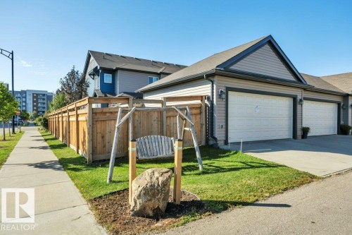 With community swing hand crafted by owner - 160 Desrochers Gate Sw, Edmonton, AB 