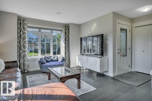 Rich hardwood flooring, south facing windows - 160 Desrochers Gate Sw, Edmonton, AB 