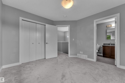 Newly carpeted primary room with a 4 pc ensuite - 12221 117 Avenue Nw, Edmonton, AB - Indoor