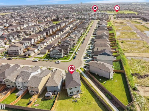 Suburban neighborhood featuring a grid of residential properties with varied exterior finishes - 22650 99A Avenue Nw, Edmonton, AB - Outdoor With View