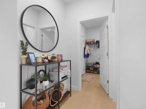 Hallway featuring light wood-finish flooring and white walls - 22650 99A Avenue Nw, Edmonton, AB - Indoor Photo Showing Other Room