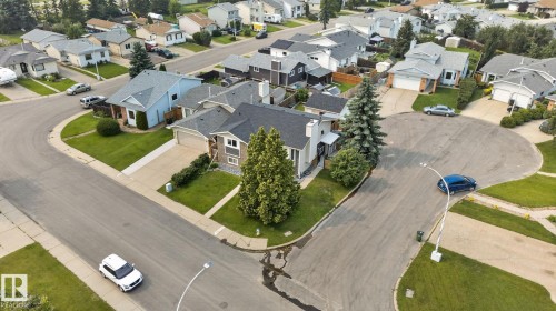 Aerial perspective showcasing a residential neighborhood with curved streets - 9530 174 Avenue Nw, Edmonton, AB - Outdoor With View
