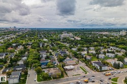 Expansive cityscape with a prominent urban skyline in the distance - 
