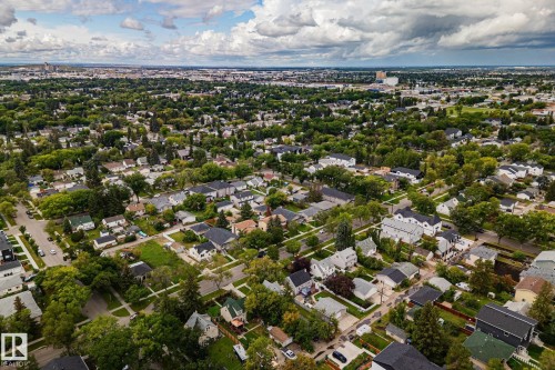 Expansive neighborhood featuring mature tree-lined streets and a variety of residential structures - 11935 125 Street Nw, Edmonton, AB 