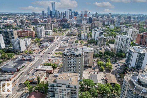 Cityscape with a prominent skyline featuring multiple high-rise buildings and commercial structures - #702 10045 117 St Nw, Edmonton, AB 